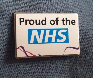 Badge: ‘Proud of the NHS’ Lapel Pin – Keep Our NHS Public