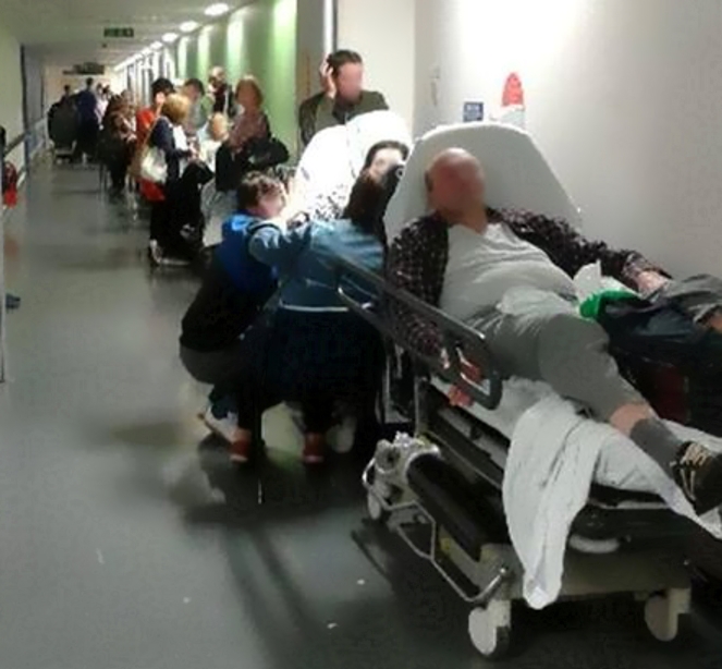 Picture from the Mirror (31 May 15) showing patients on trolleys waiting for treatment at Stafford Hospital