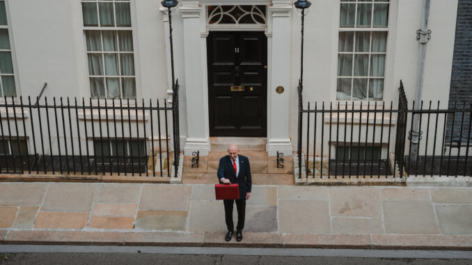 John Healey prepares to deliver the Budget at 11 Downing Street.